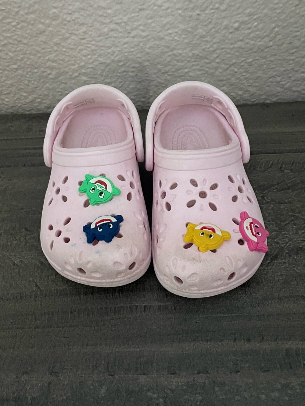Crocs Kids Light Pink Slip-On Clogs with Playful Charms